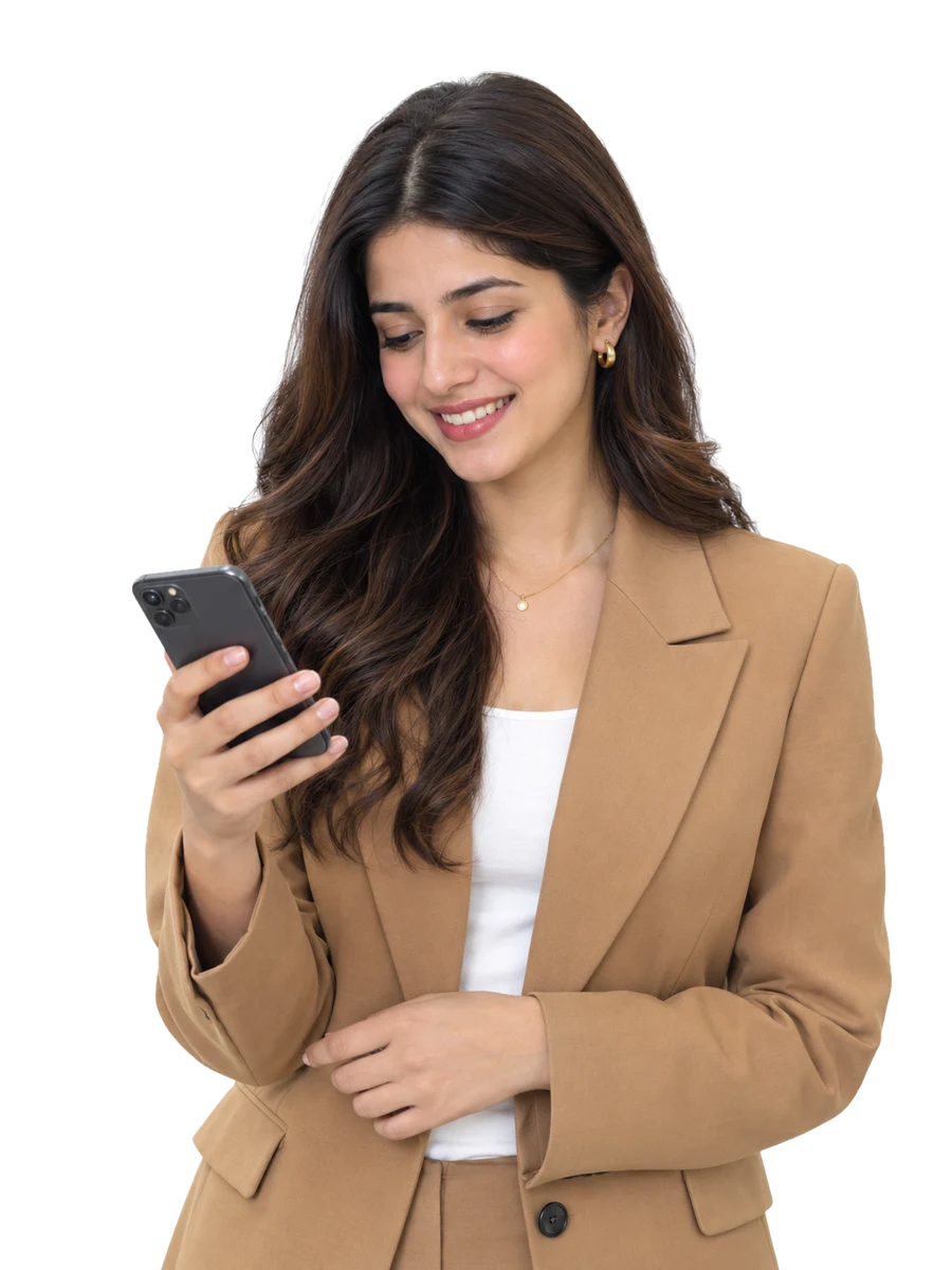 A business owner smiling at an order notification on her phone